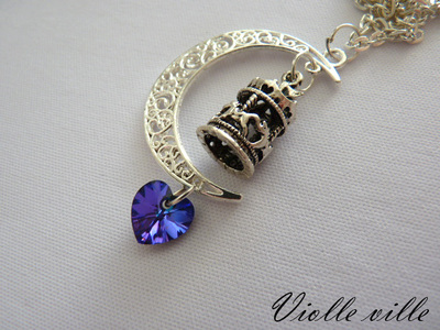 Moon and carosel necklace