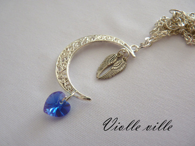 Moon and wings necklace