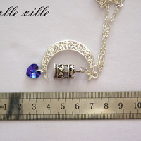 Moon and wings necklace - Thumbnail 1