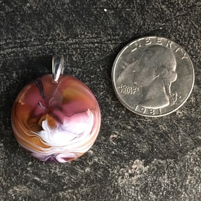 Salmon pink and cinnabar glass pendant