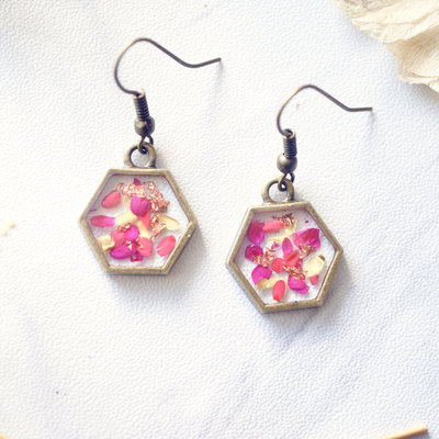Real pressed flowers and resin earrings in neon pink yellow and copper flakes