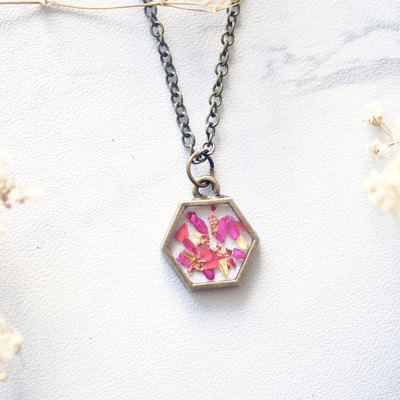 Real dried flowers in resin necklace in neon pink yellow gold flakes