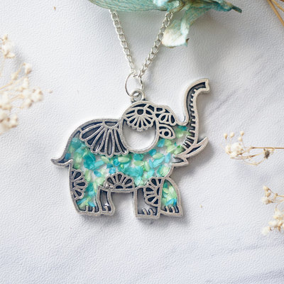Real dried flowers in resin silver tribal elephant necklace in mint teal mix