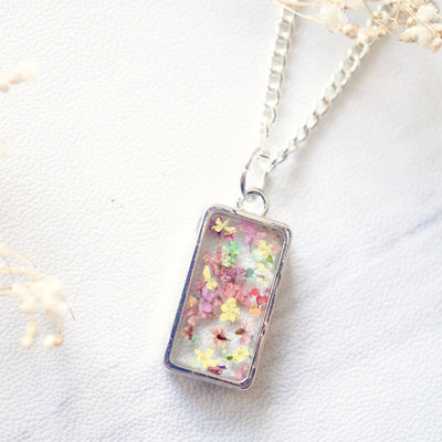 Real dried flowers in resin necklace in pink pastel mix