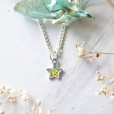 Real dried flowers in resin star necklace in green and yellow