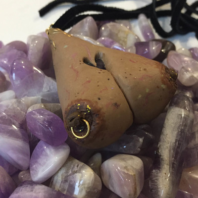 Goldie titty pendant