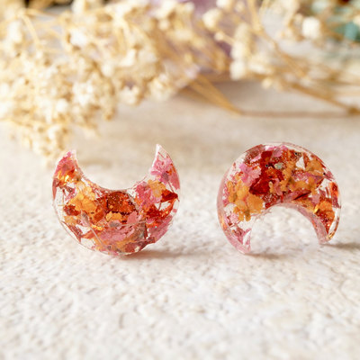 Real dried flowers and resin moon stud earrings in orange and red