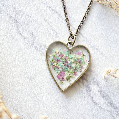 Real dried flowers in resin heart necklace in green mint pink purple