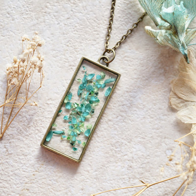 Real dried flowers and resin necklace, rectangle teal and mint with teal flakes