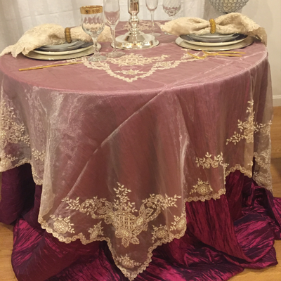 Rental: couture tablecloth & overlays 