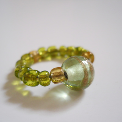 Light green and golden bead ring