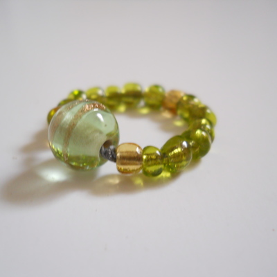 Light green and golden bead ring