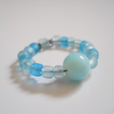 Frosty blue ice bead ring