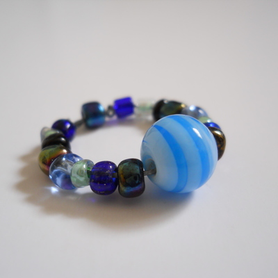 Blue swirl bead ring