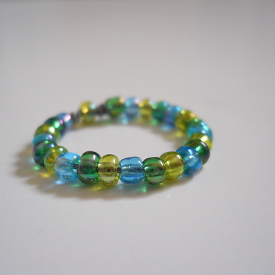 Blue, green and yellow bead ring