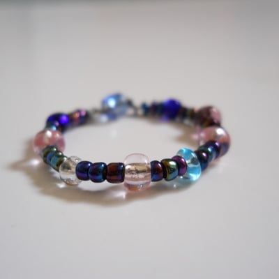 Blue, pink and purple bead ring