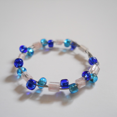 Light and dark blue bead ring