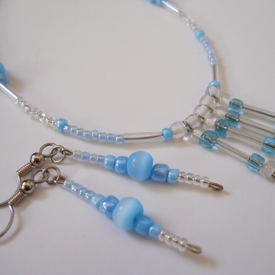 Blissful blue bead necklace and earrings