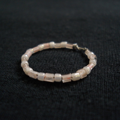 White powder bead ring