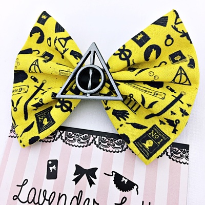 Yellow hufflepuff harry potter inspired hair bow with deathly hallows charm - Thumbnail 2