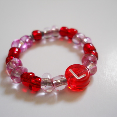 Letter l bead ring