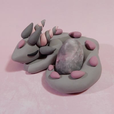 Pink and grey rock dragon