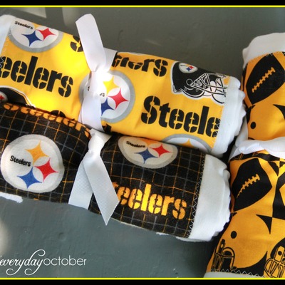 Black and gold burp cloths