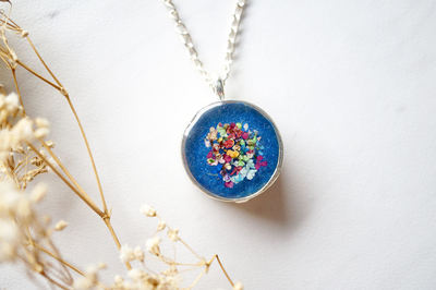 Real Dried Flowers in Resin Necklace, Thick Silver Circle in Blue Party Mix