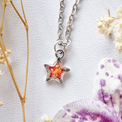Real dried flowers in resin star necklace in orange and red