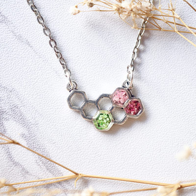 Real dried flowers in honeycomb resin necklace in green and pinks