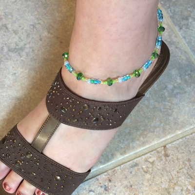 Adjustable aqua and lime green anklet with flip flop charm