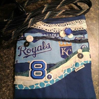 Custom themed across body pouch