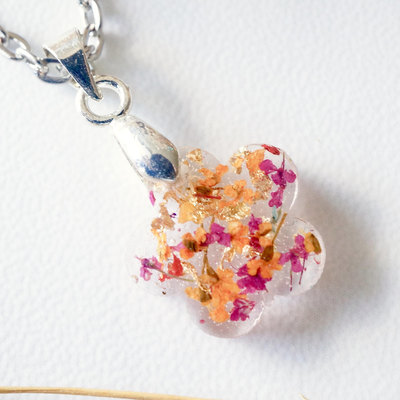 Real dried flowers in moon resin necklace in magenta orange and gold flakes