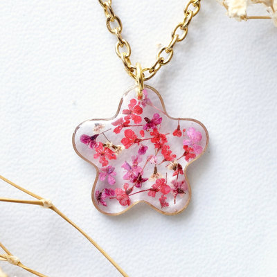 Real dried flowers in resin necklace, small gold frame in pinks and reds