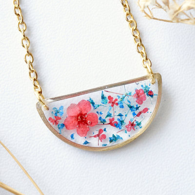Real dried flowers in resin necklace, half circle in blue and red
