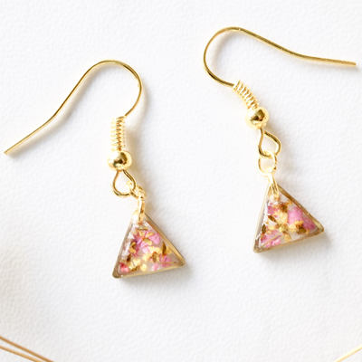 Real dried flowers and resin earrings, gold triangle drops in pink and yellow