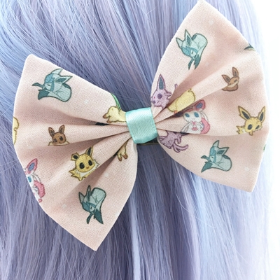 Pastel pink kawaii eevee printed fabric bow -- geeky & girly pokemon hair clip - Thumbnail 2