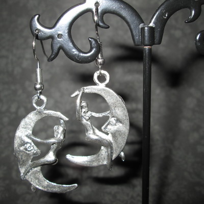Crescent moon earrings with skyclad woman