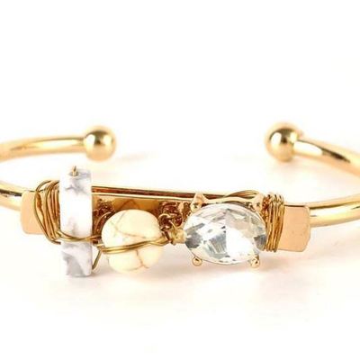 3 stone gold bangle in ivory