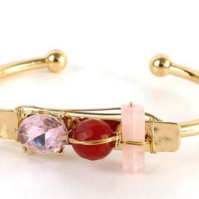 3 stone gold bangle in red & pink