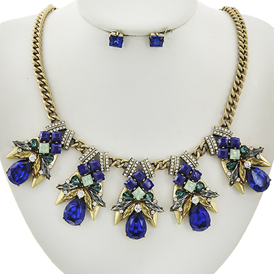 Statement gold necklace in blue