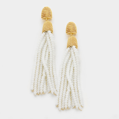 Gold detailed earrings in ivory