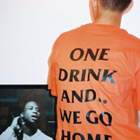 ONE DRINK AND WE GO HOME T SHIRT IN ORANGE - Thumbnail 1