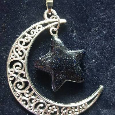 Crescent moon pendant - blue goldstone