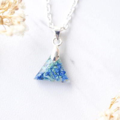 Real dried flowers in triangle resin necklace in blue mint