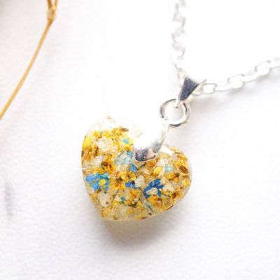 Real dried flowers in heart resin necklace in yellow mix