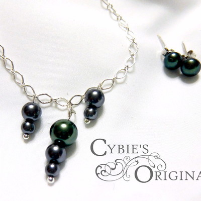 Delicate green pearl necklace and earring set.