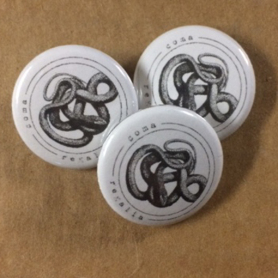 Coma regalia "snake" button