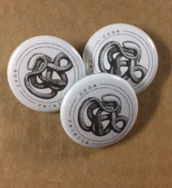 Coma Regalia "snake" button