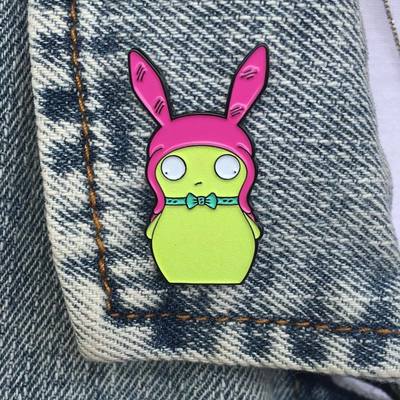 Loo-eez-eh ko-pee no-longer-a-mystery variant pin